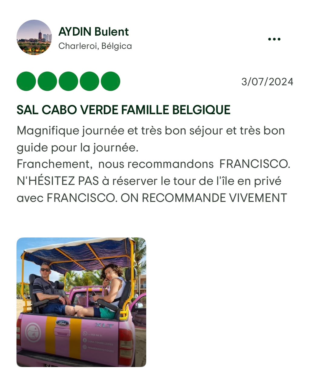 Family riding the pink pickup truck during a private tour on Sal Island, Cape Verde